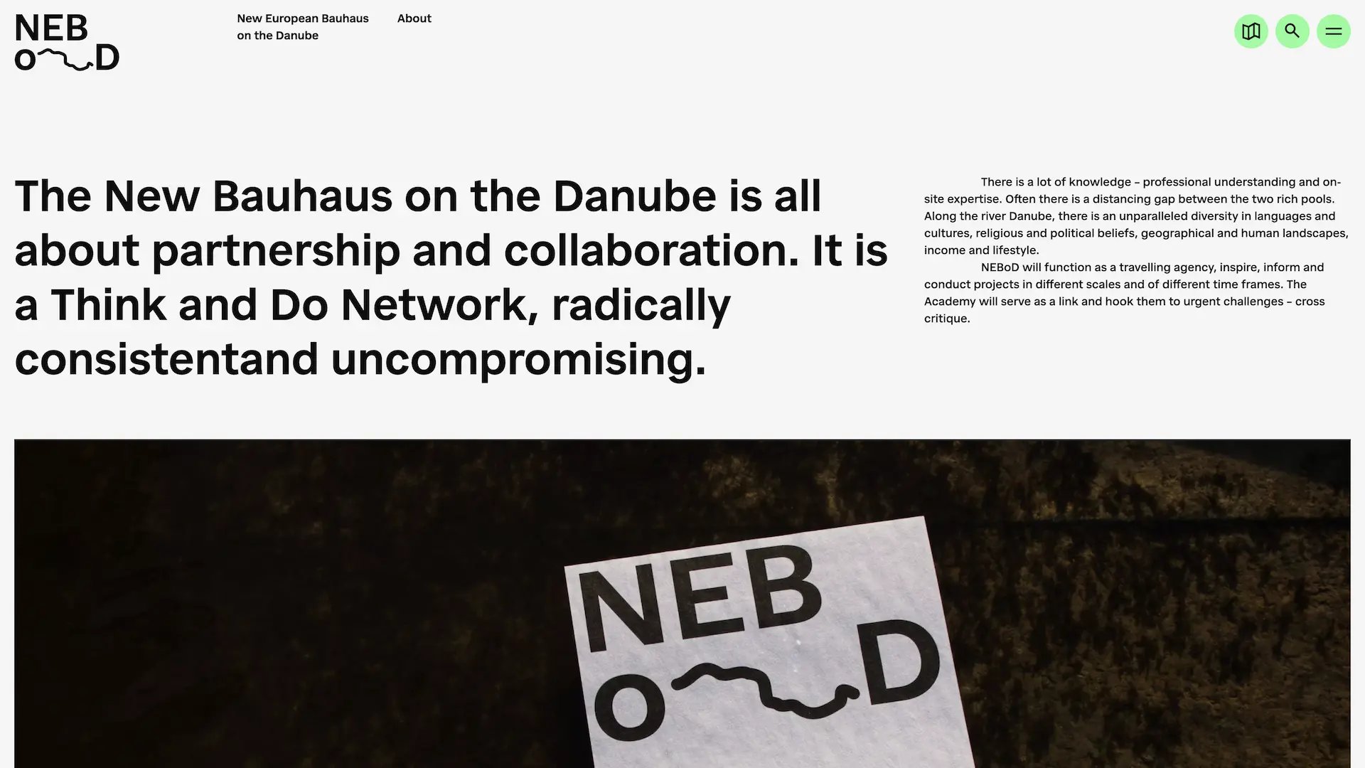 NEBoD about page with a large statement on partnership and collaboration above a photo of the logo